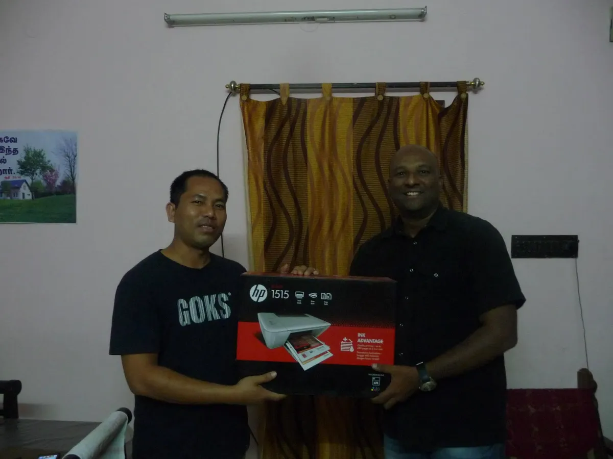 Village ministry team distributing Bibles to local churches