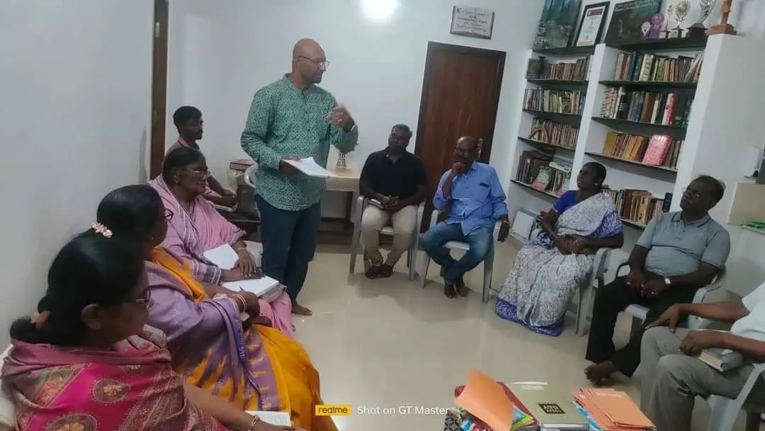 Ministry team praying with a rural congregation
