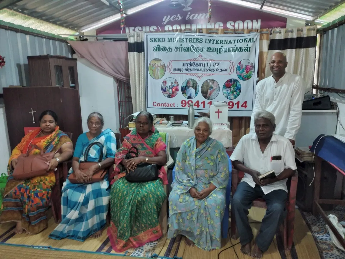 Volunteers serving at a Karisanai rural outreach event
